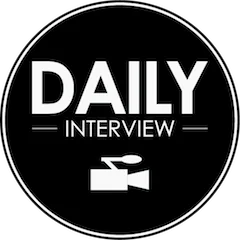Application icon of the Daily
										  Interview iOS application. On a
										  circular black background the words
										  Daily, on the next line - Interview -
										  and at the bottom an icon of a
										  proffessional film camera.